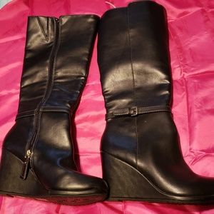 Black leather wedge boots